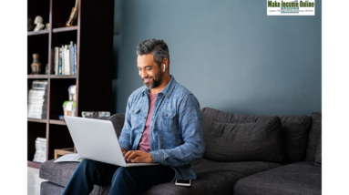 Man working from home on his sofa with a computer, exploring top freelancing platforms for remote work."