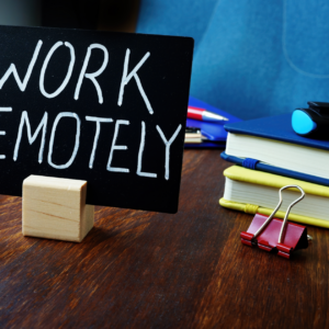 A sign on a desk that says 'Work Remotely,' symbolizing Amazon remote jobs in 2024."