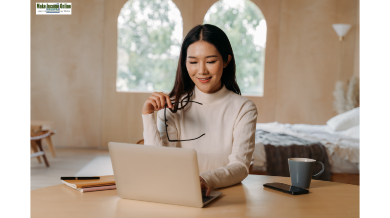 A woman working from home on her computer, representing part-time remote jobs in 2024."